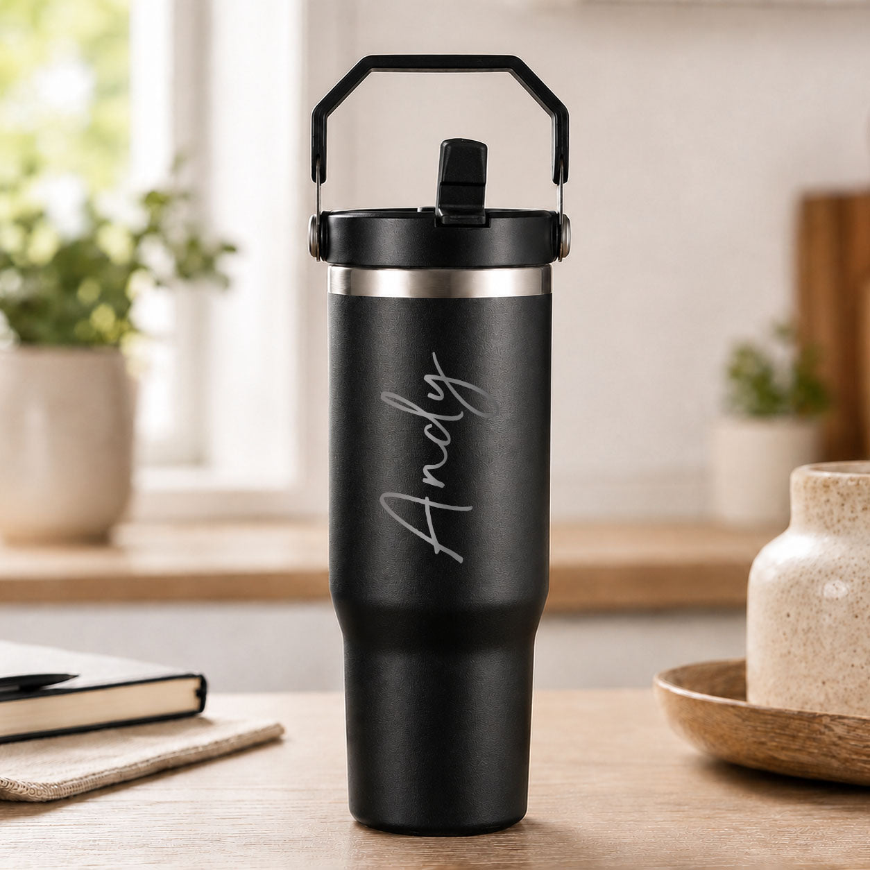 Personalised black insulated travel cup with large engraved name and flip straw