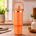Personalised orange insulated travel cup with large engraved name and flip straw